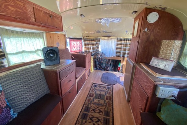 a room filled with furniture and a stove