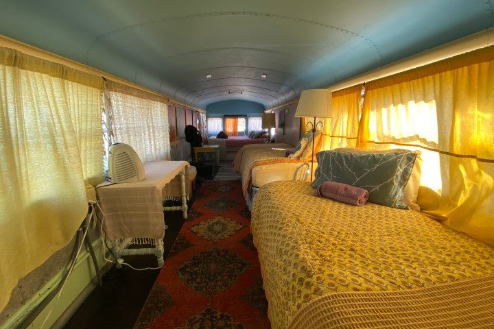 a bedroom with a large bed in a room