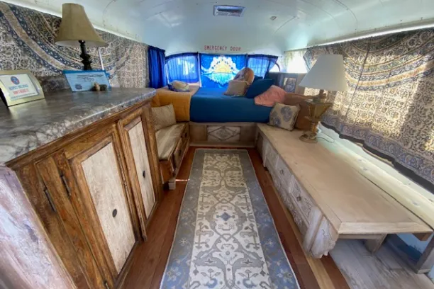 a living room filled with furniture and a fireplace