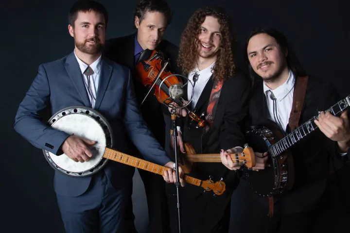 a group of people posing for the camera