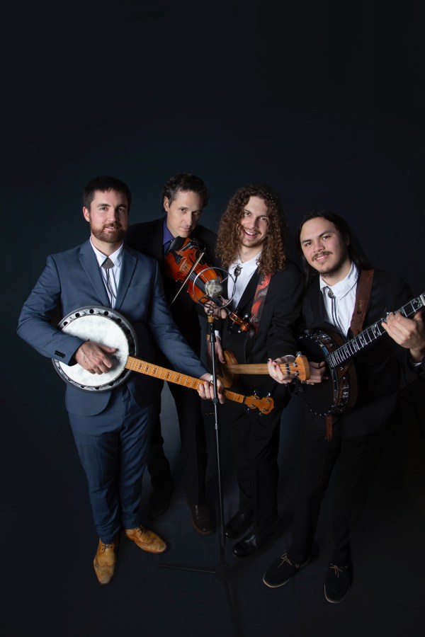 a group of people posing for the camera
