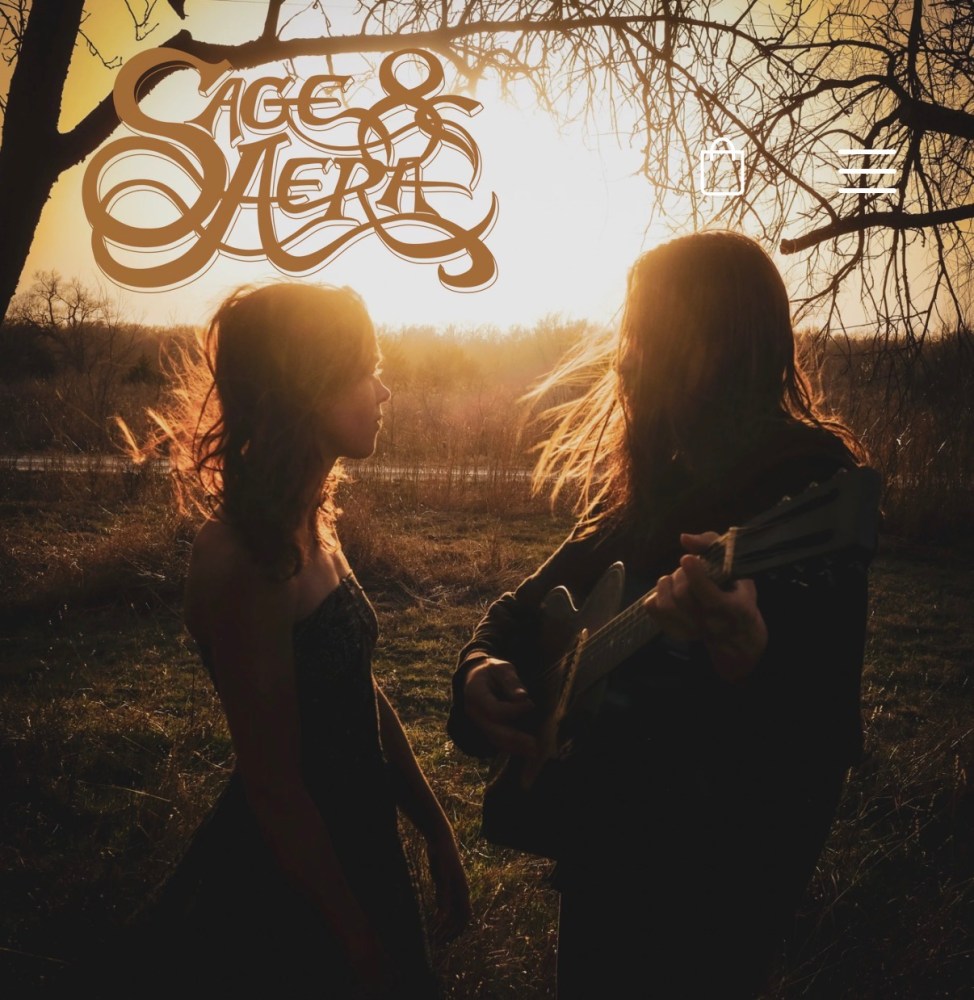 Silhouetted man with guitar and woman in field at sunset, with 'Sage & Sea' text above.